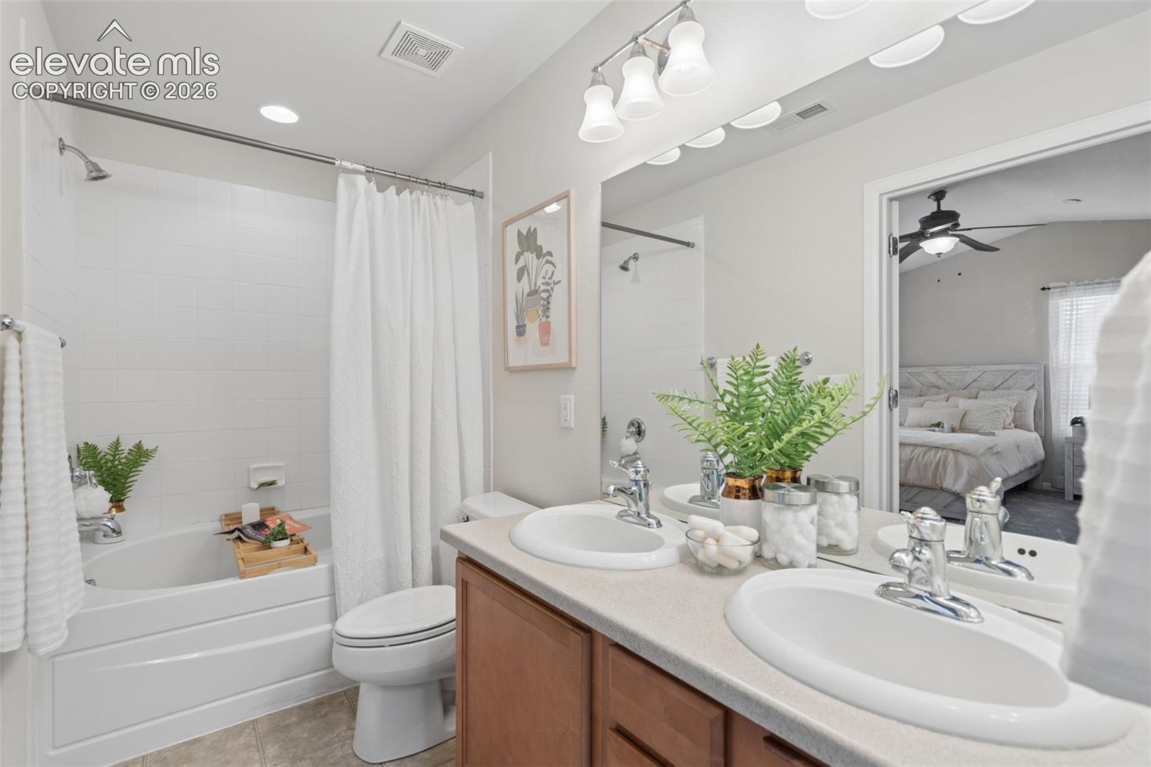 Primary bathroom with dual vanities large soaking tub