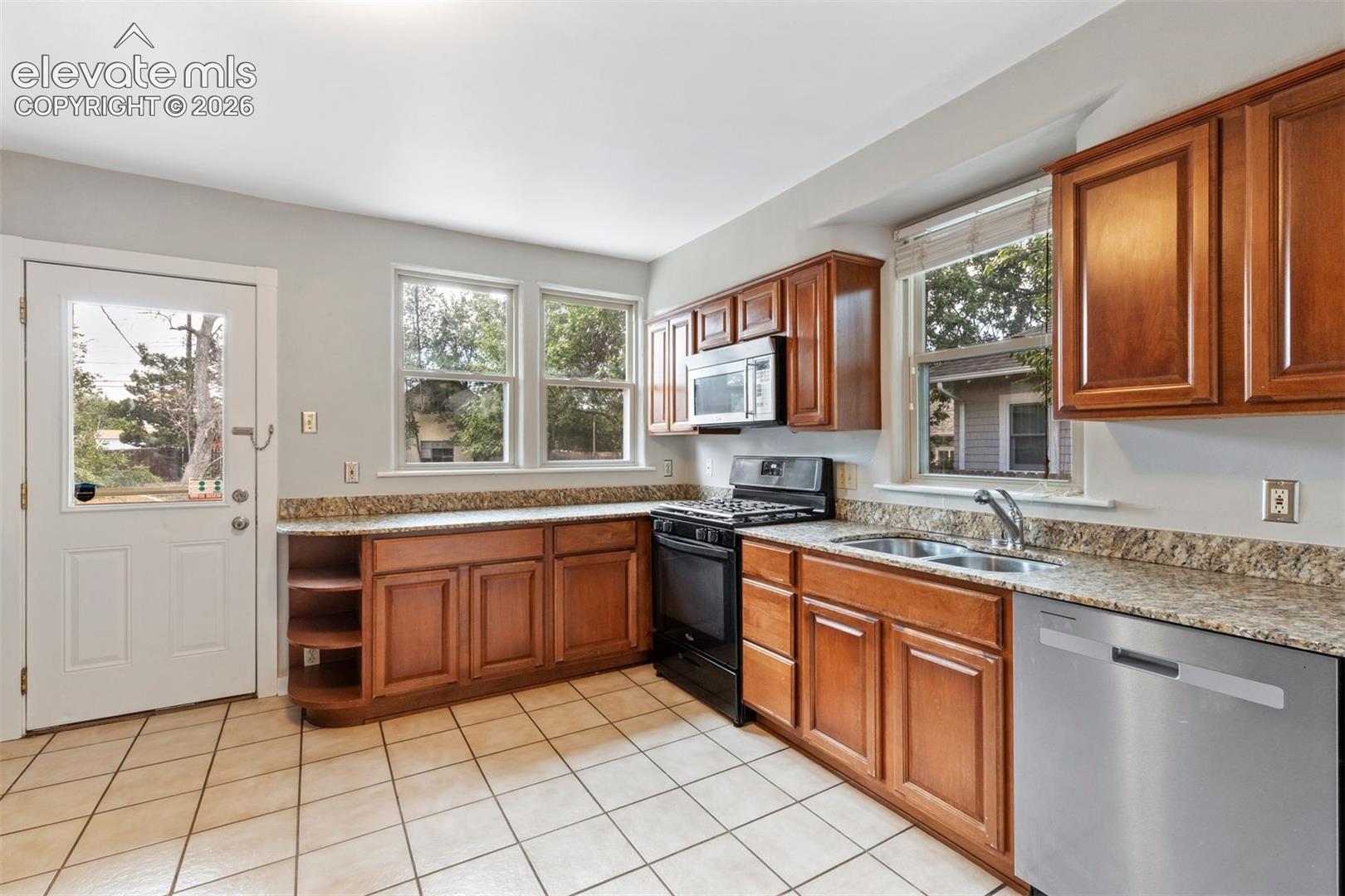 Update kitchen, walk out access, granite counters