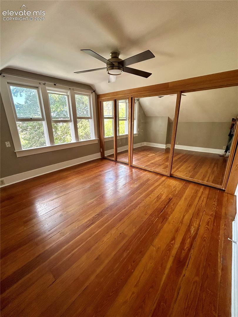 Main House/602: 1 of 2 large bedrooms with hardwood floors, large closet and ceiling fan