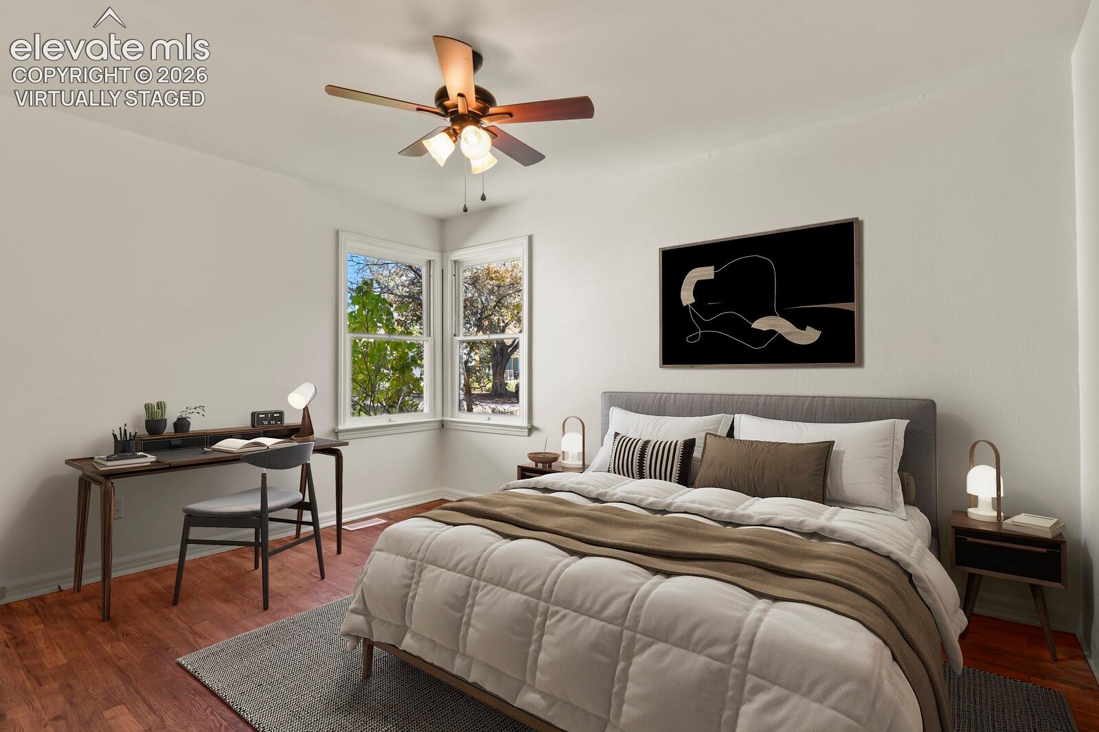 Virtually staged primary bedroom with double corner window and natural light 
