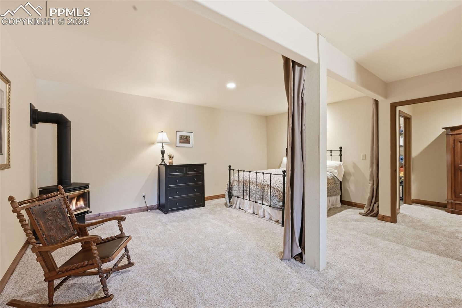 The garden level family room is currently configured to as a guest bedroom. 