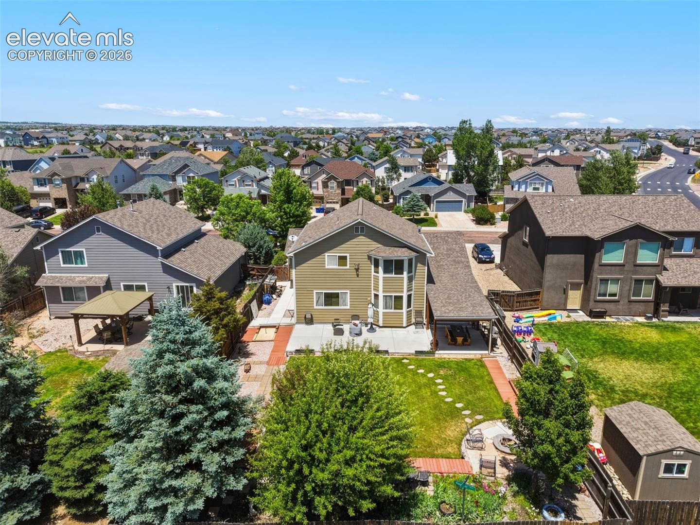 Fully Fenced Backyard & Outdoor Living Areas