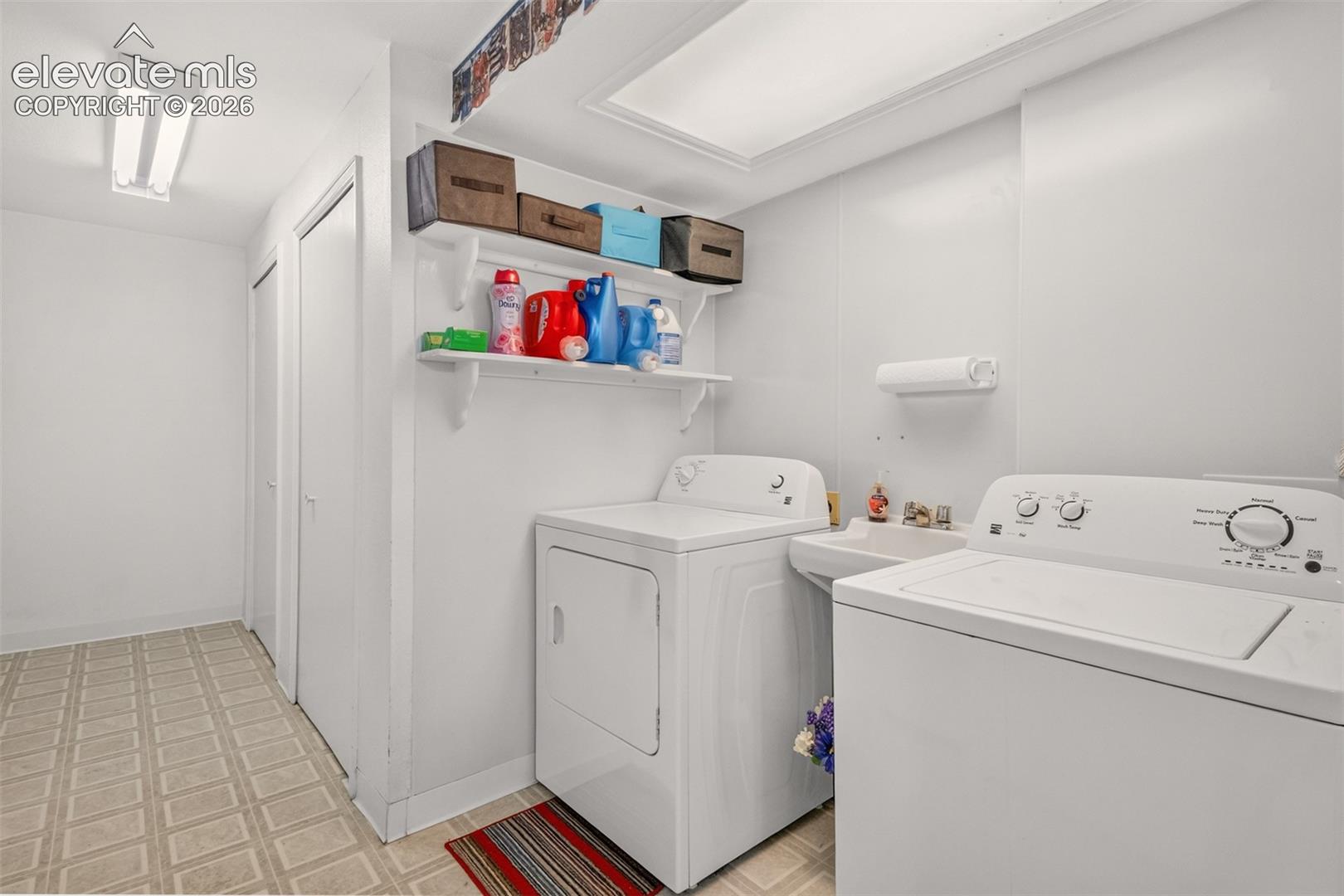 Laundry Room with Washer and Dryer Included