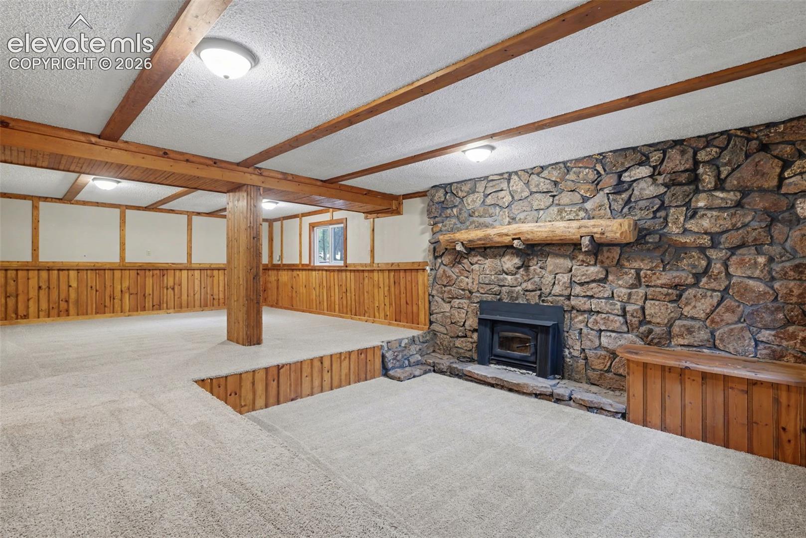 Wood stove with a fan will heat the whole house