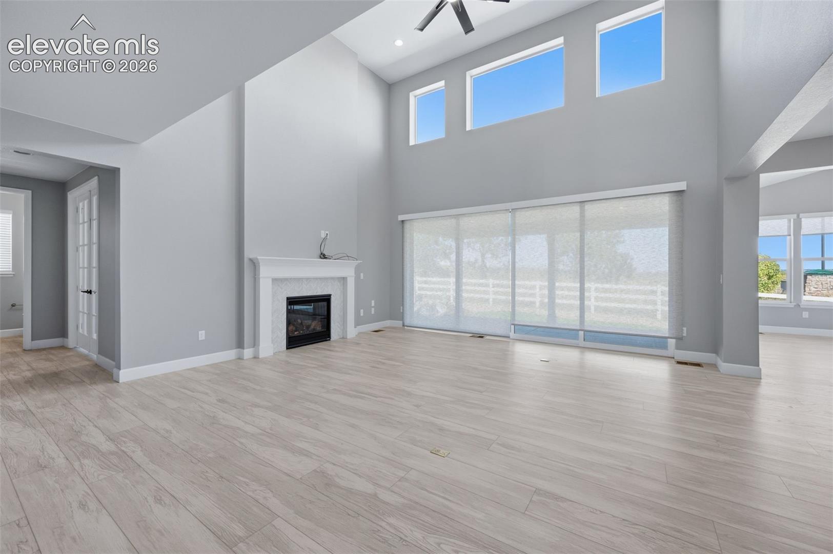 Accordian Patio Doors Open To Covered Patio