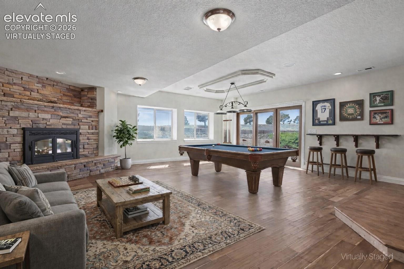 Virtually Staged -Basement Walk-Out Family Room w/Pellet Stove and Vintage Bar