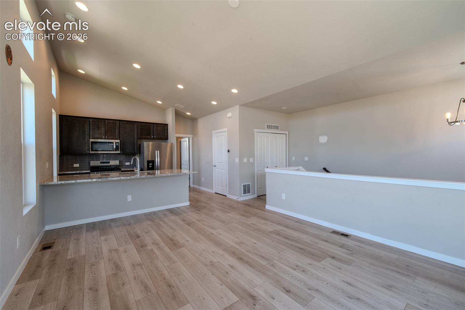 View of the Kitchen from the Living Room/Dining Room.