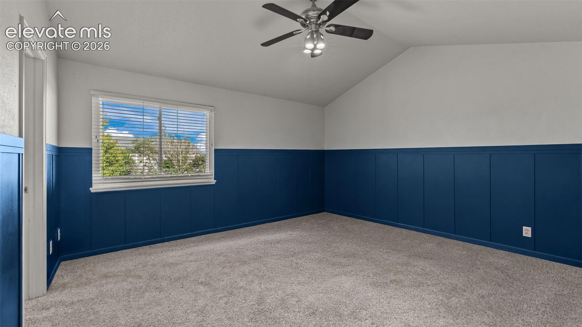 Vaulted ceiling with an attached ceiling fan