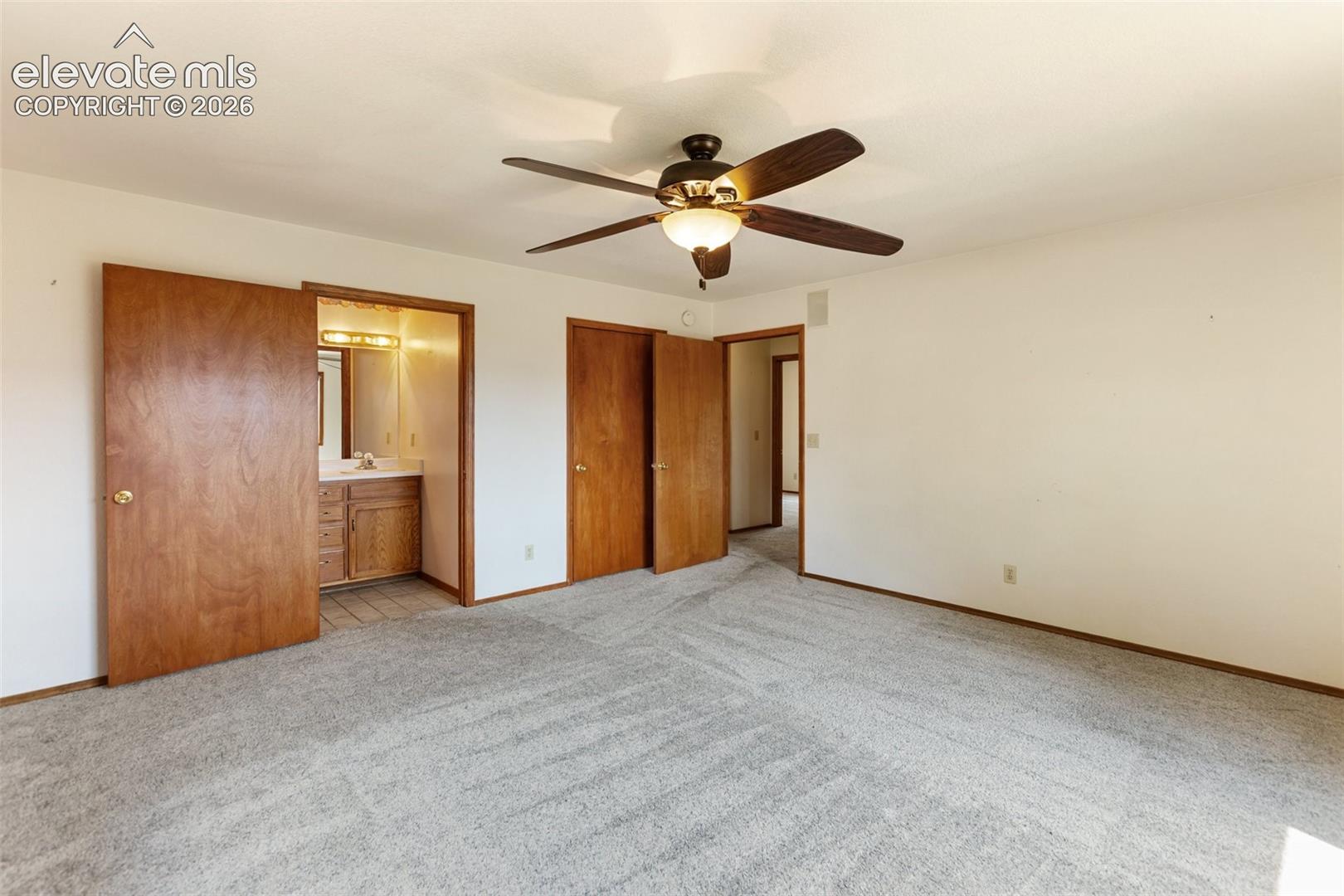 Primary Bedroom with Private Primary Bathroom