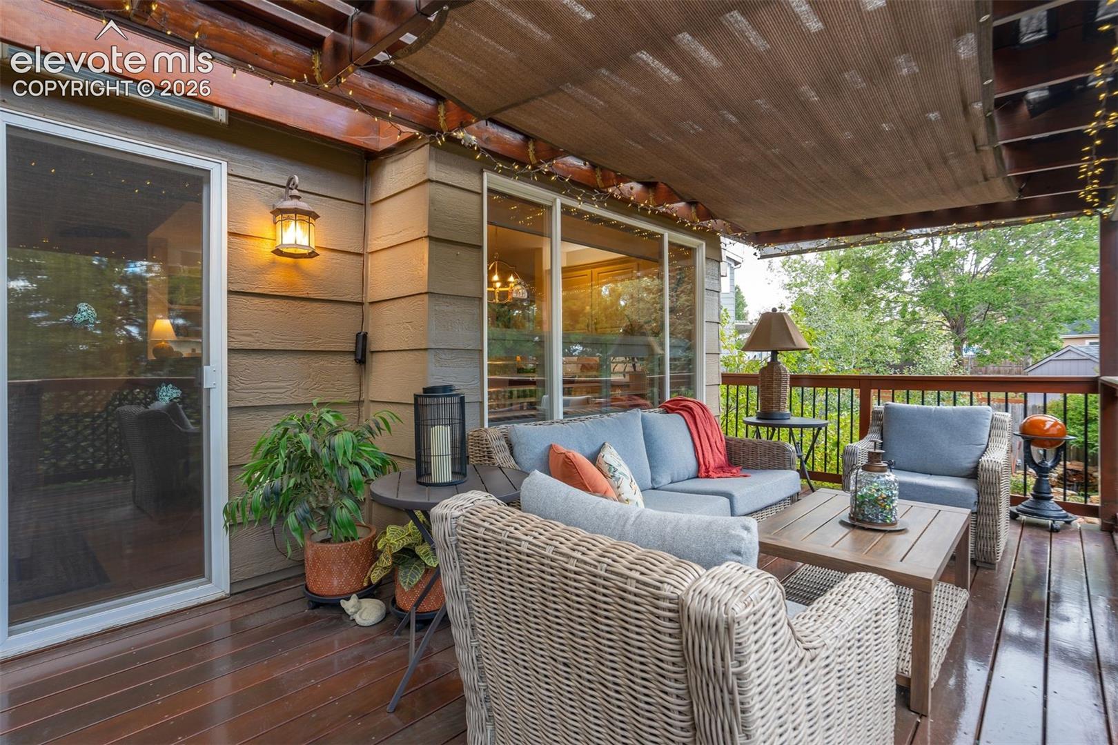 Massive back deck made from Brazilian hardwood also features a pergola convering the entire deck.