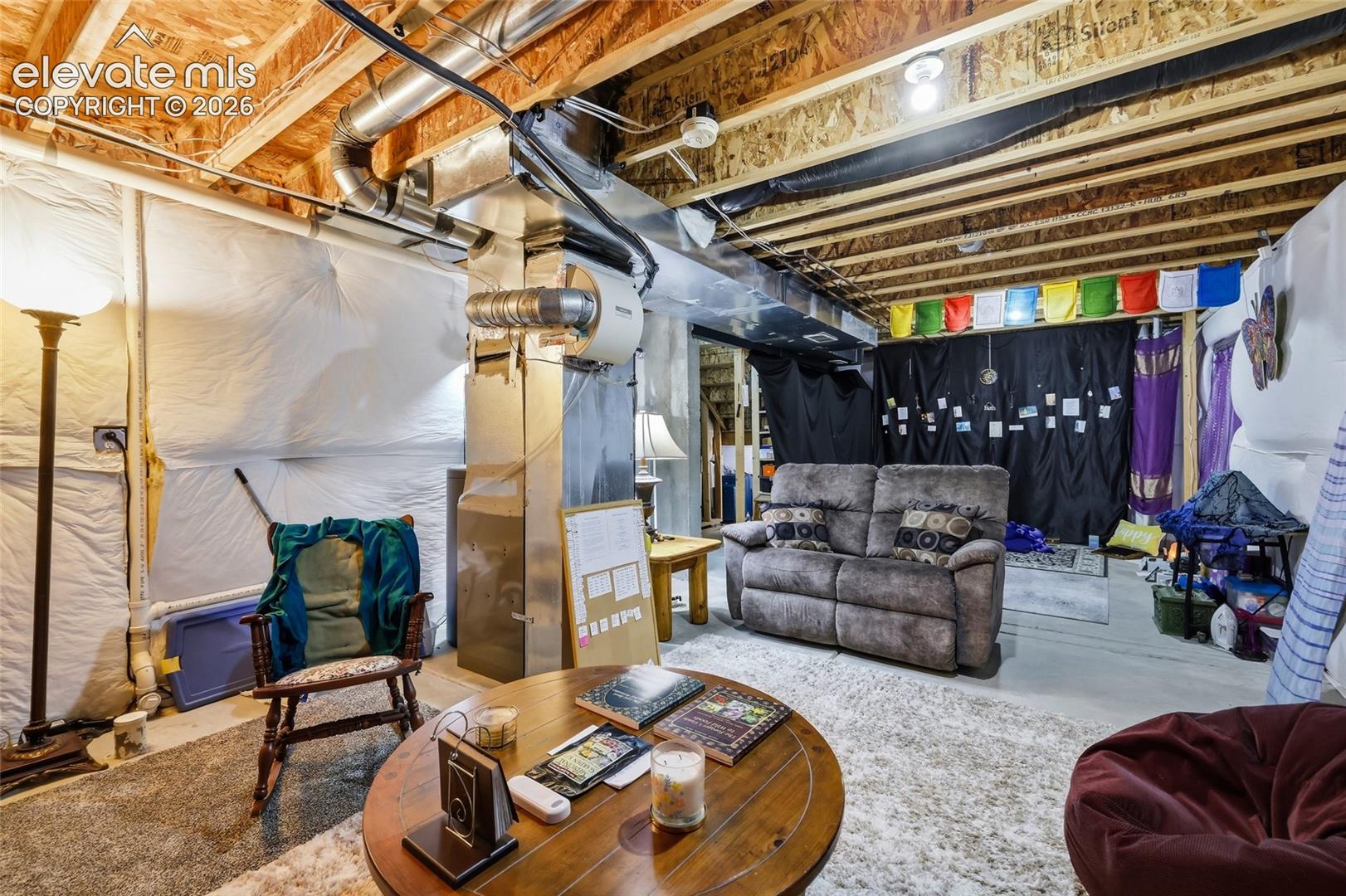 Basement unfinished area being used as living area