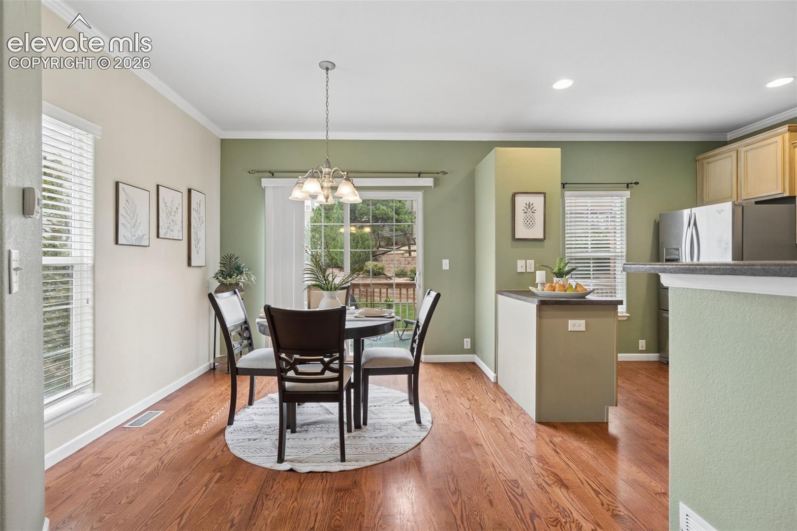 Cozy Dining Room with walk-out to the spacious deck