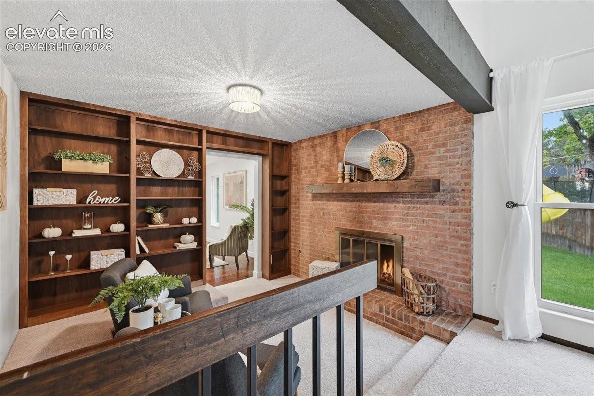 Built in's in the Den with Gas fireplace. 