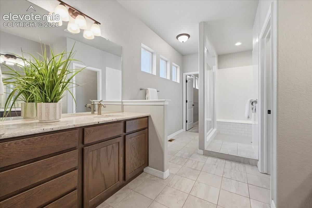 Spa like master bath with granite counters and upgraded shower!