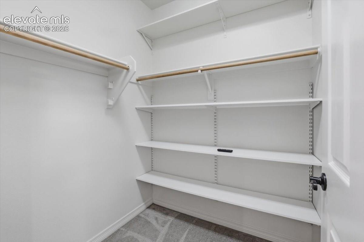 Generous walk-in closet for secondary bedroom
