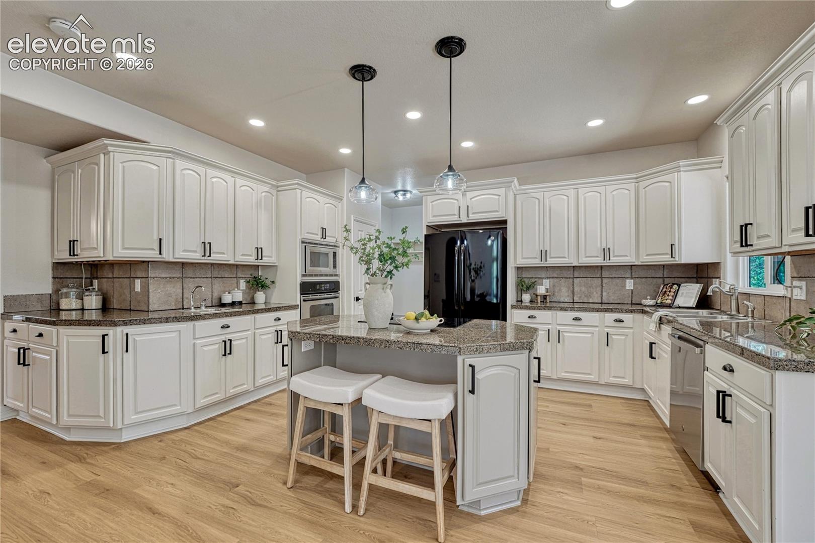 Spacious eat-in kitchen with island...