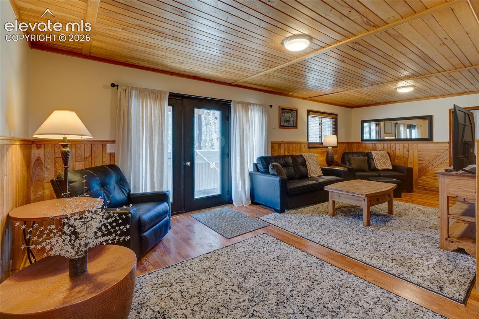 Family room on lower level with door to patio