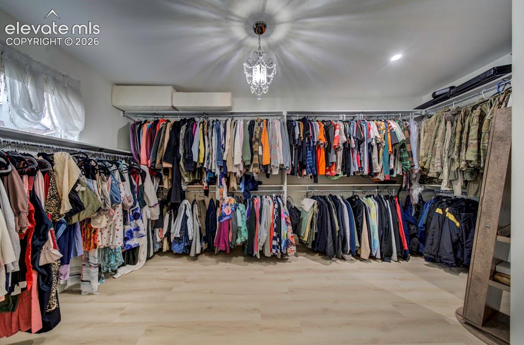 Primary oversized walk-in closet