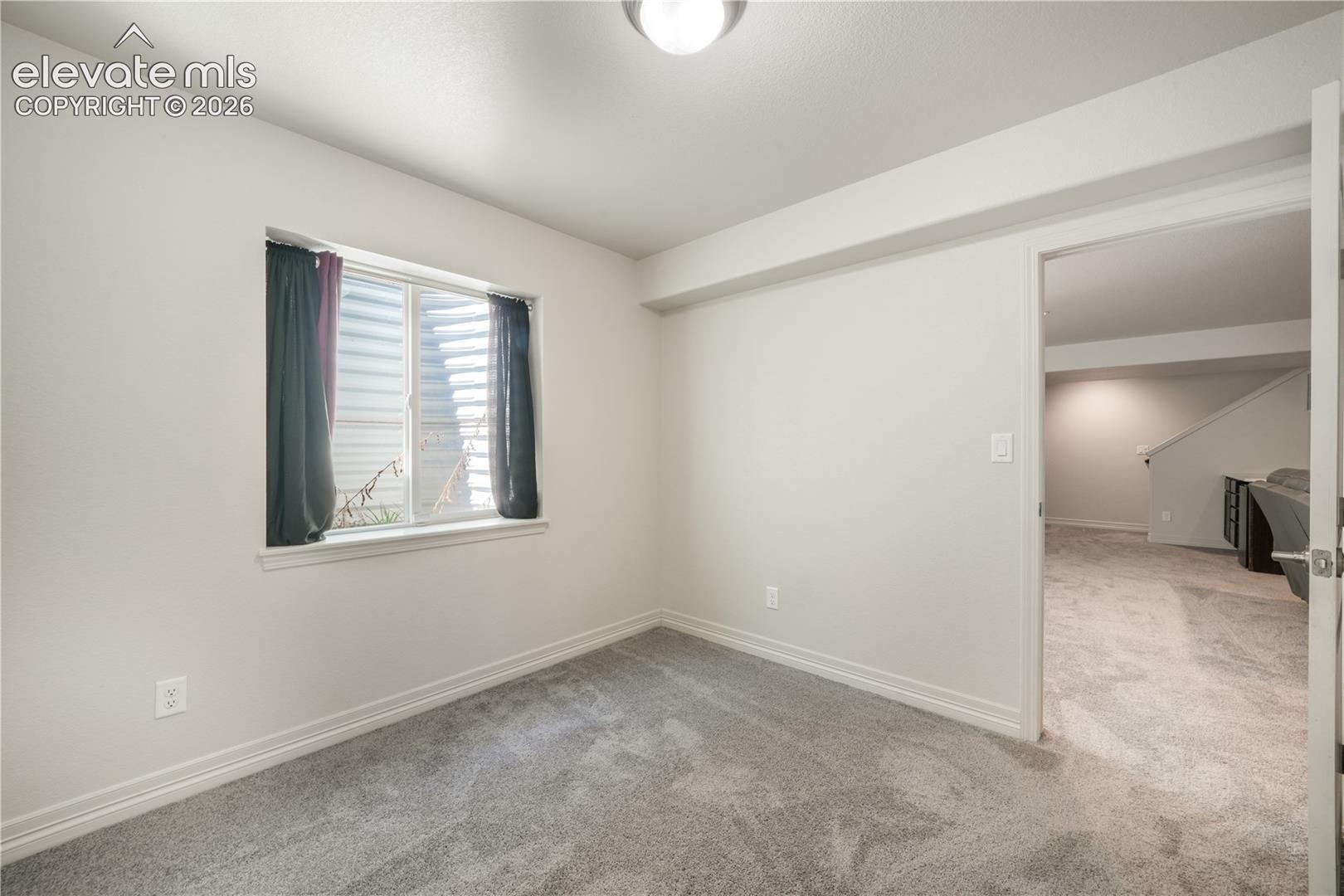 Basement flex room/office with new carpet