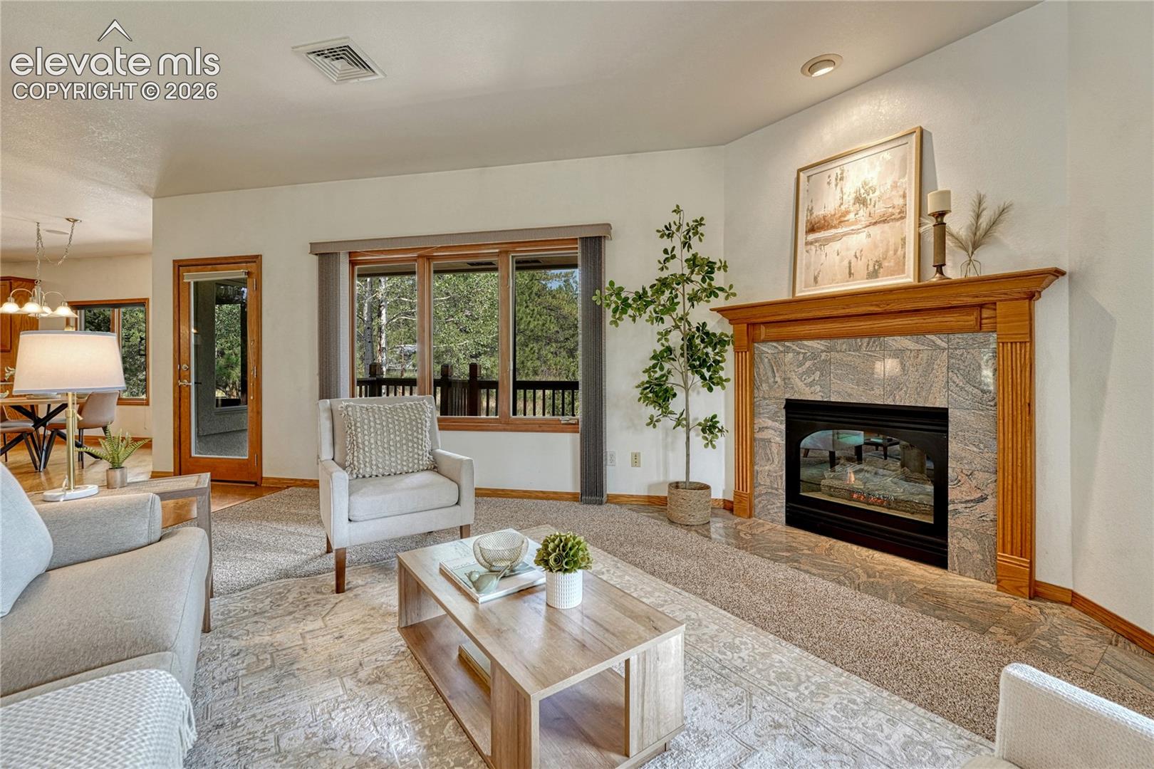Great Room with welcoming fireplace for chilly Colorado evenings.
