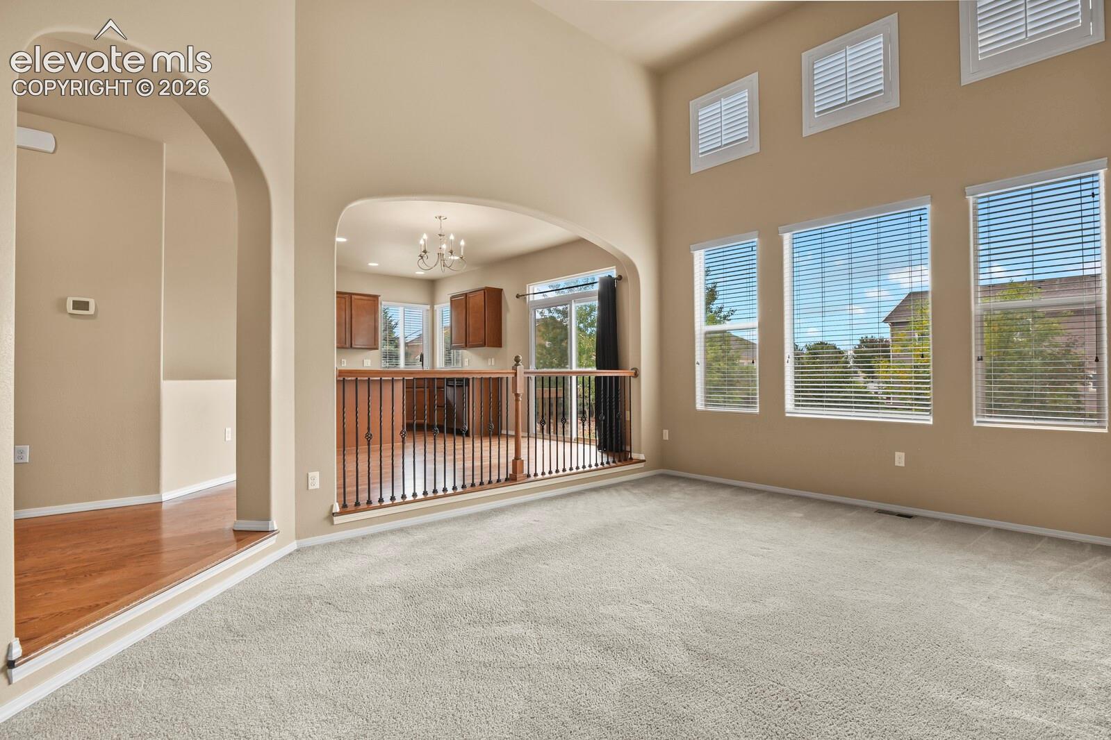 Vaulted ceilings with high windows, creating an expansive space