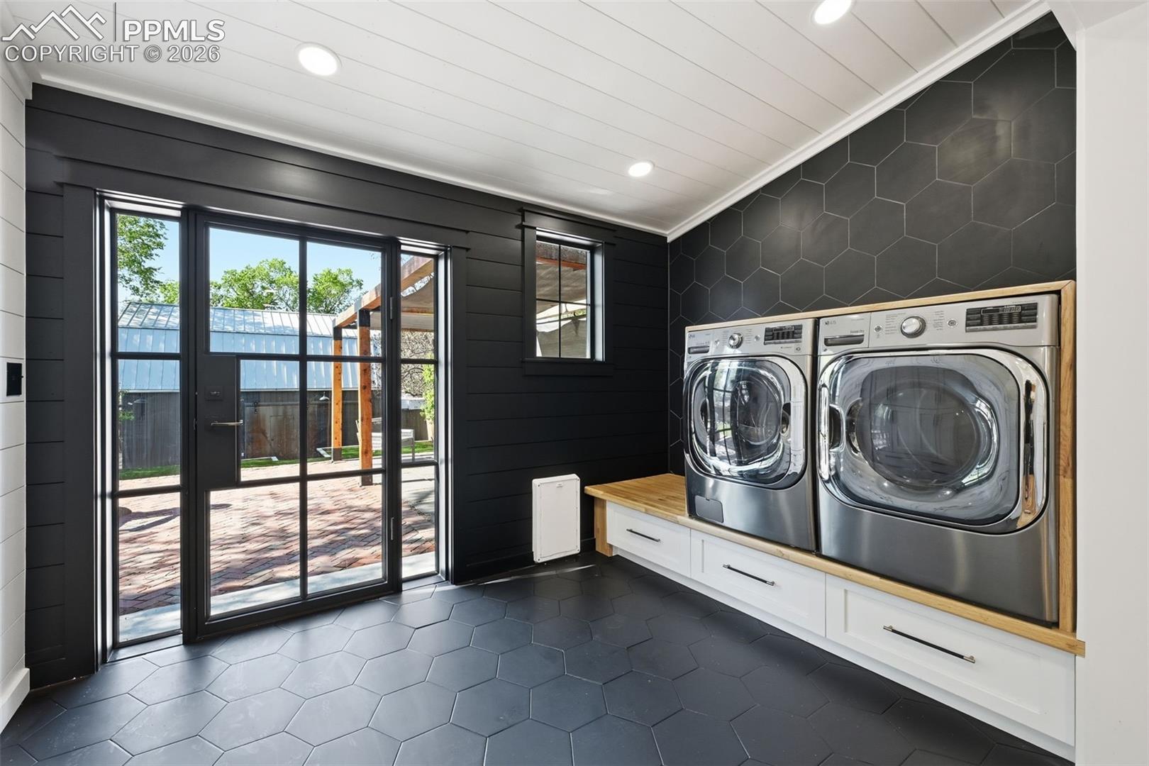 The included washer and dryer are conveniently located off the kitchen. 