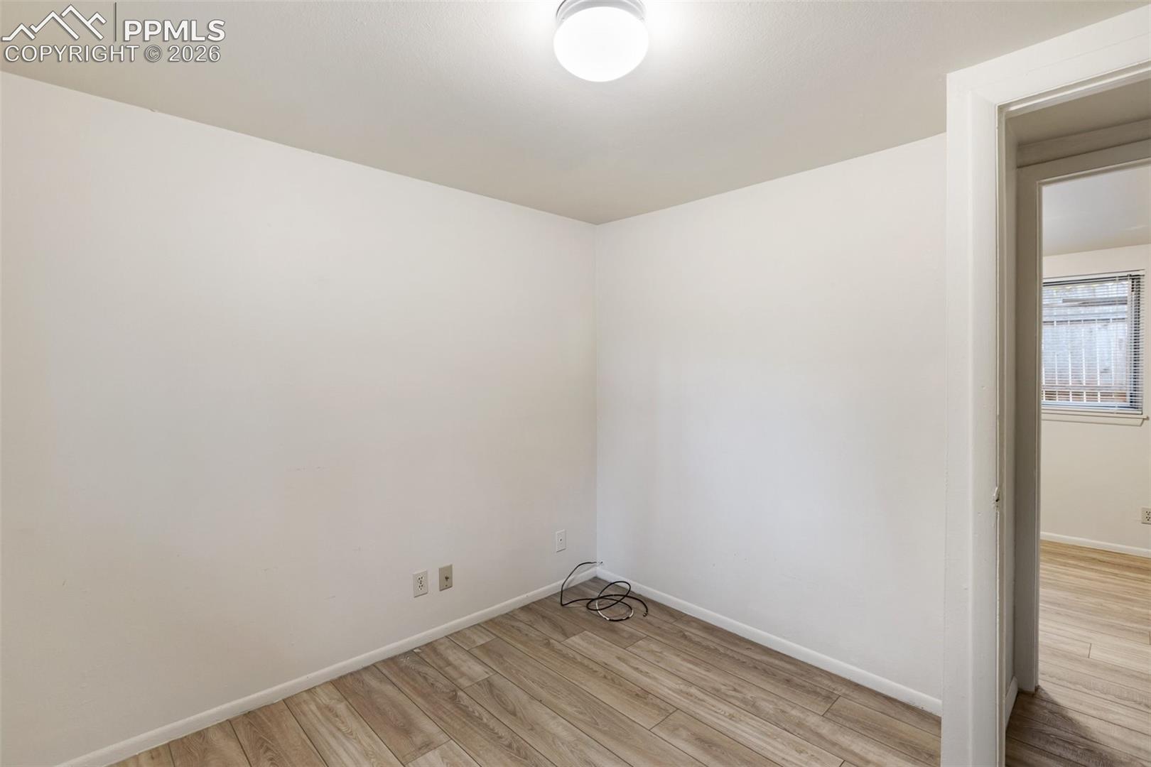 One of 2 bedrooms. Freshly painted and featuring low maintenance LVP flooring - this home is move in ready!