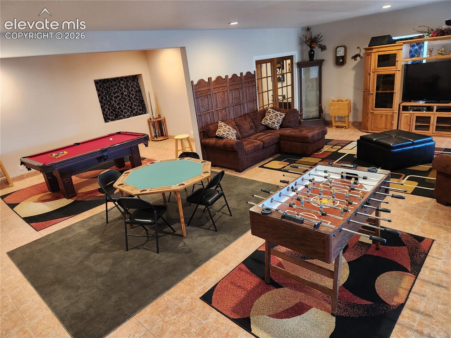 furnished - notice how many games can fit in this large room