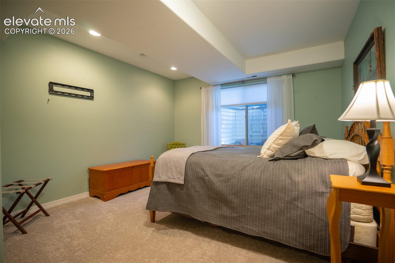 this is the 2nd bedroom in the basement apartment it measures 12x16 and has a walk-in closet