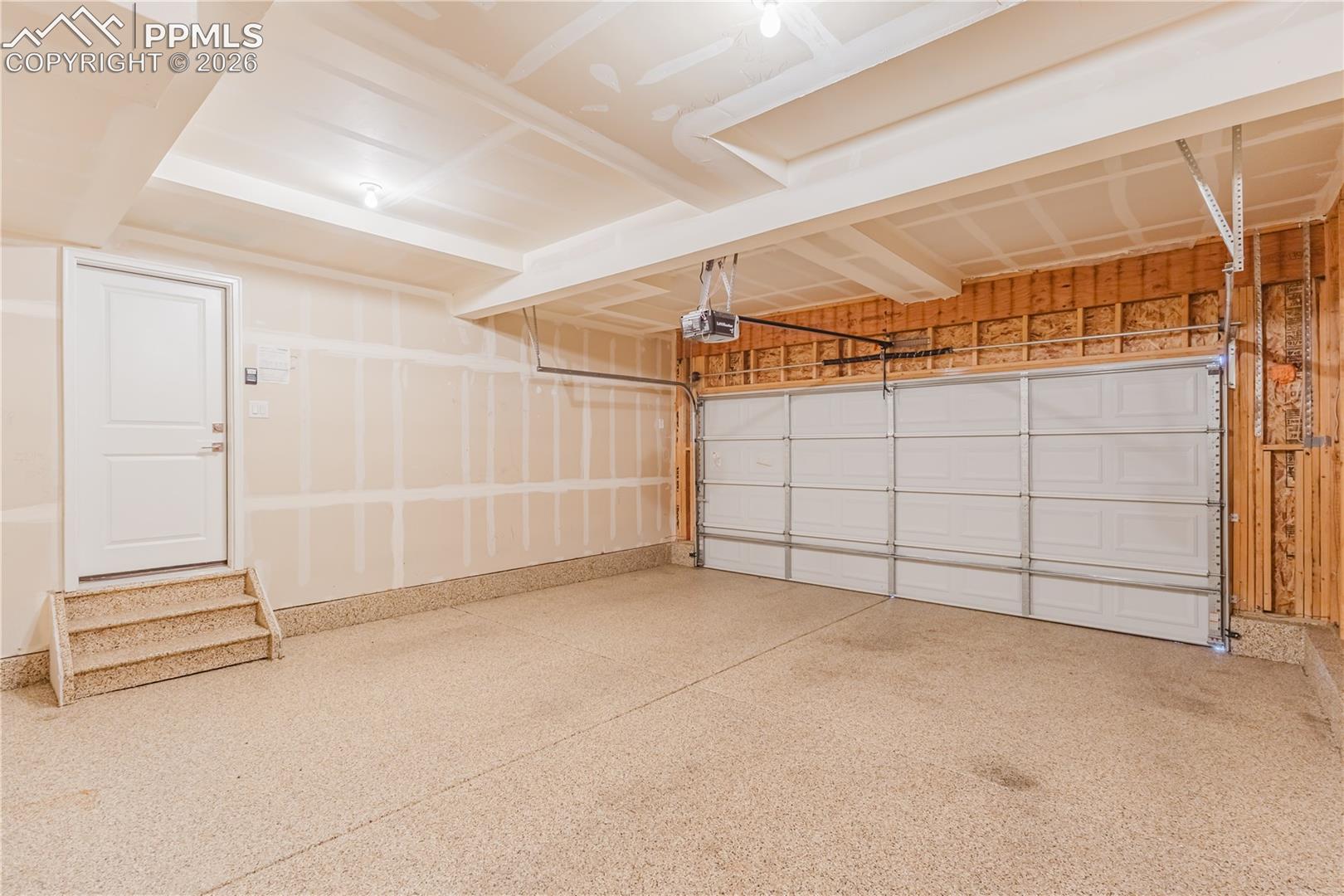Garage with epoxied floor & garage door opener