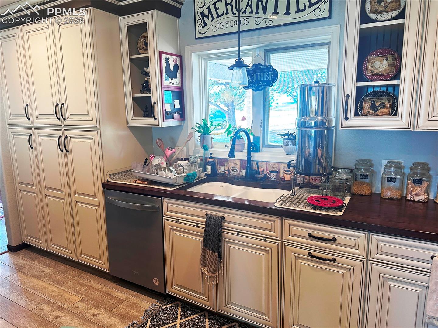 Wonderful deep cabinets with rolling shelves.