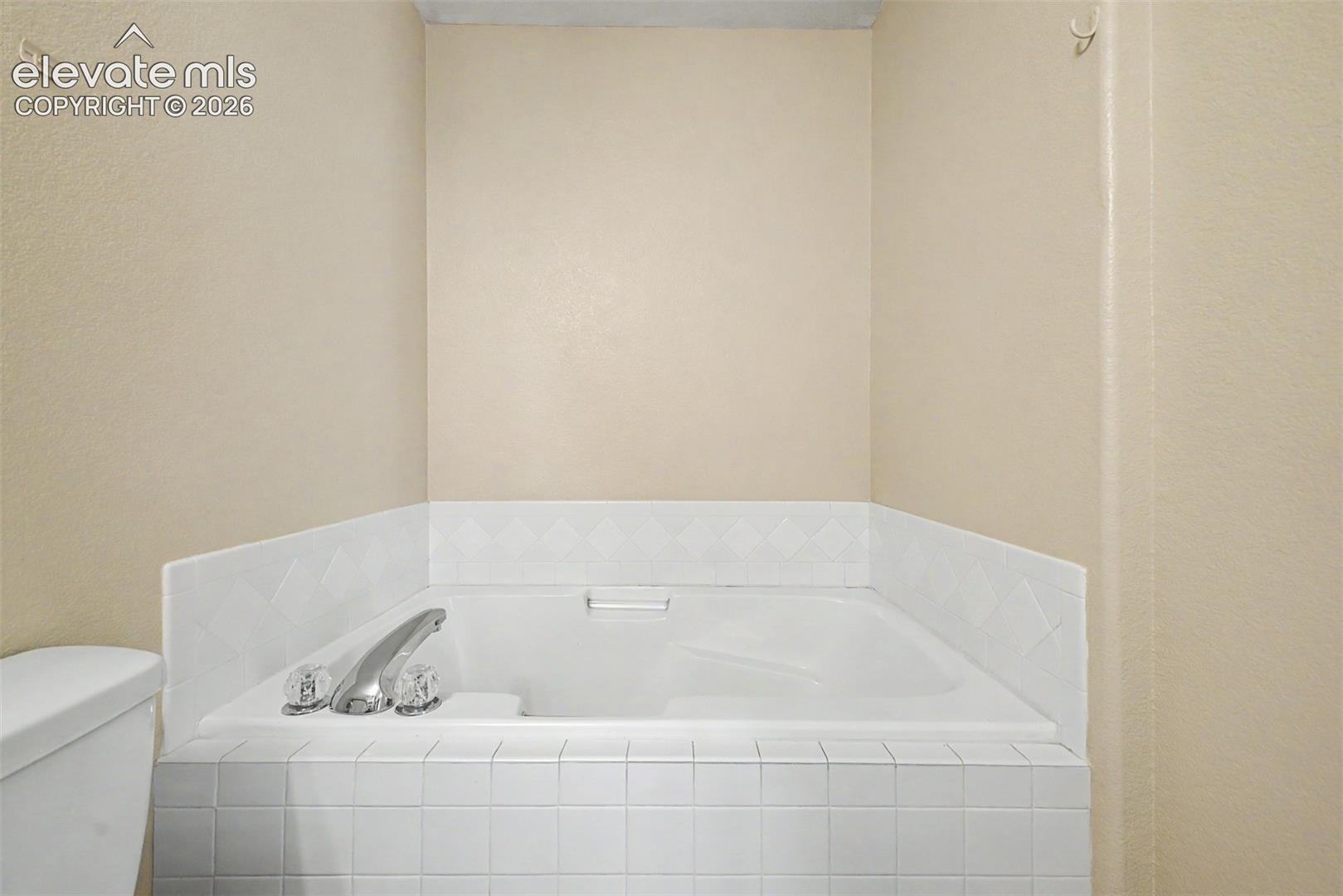 Garden tub in primary bathroom