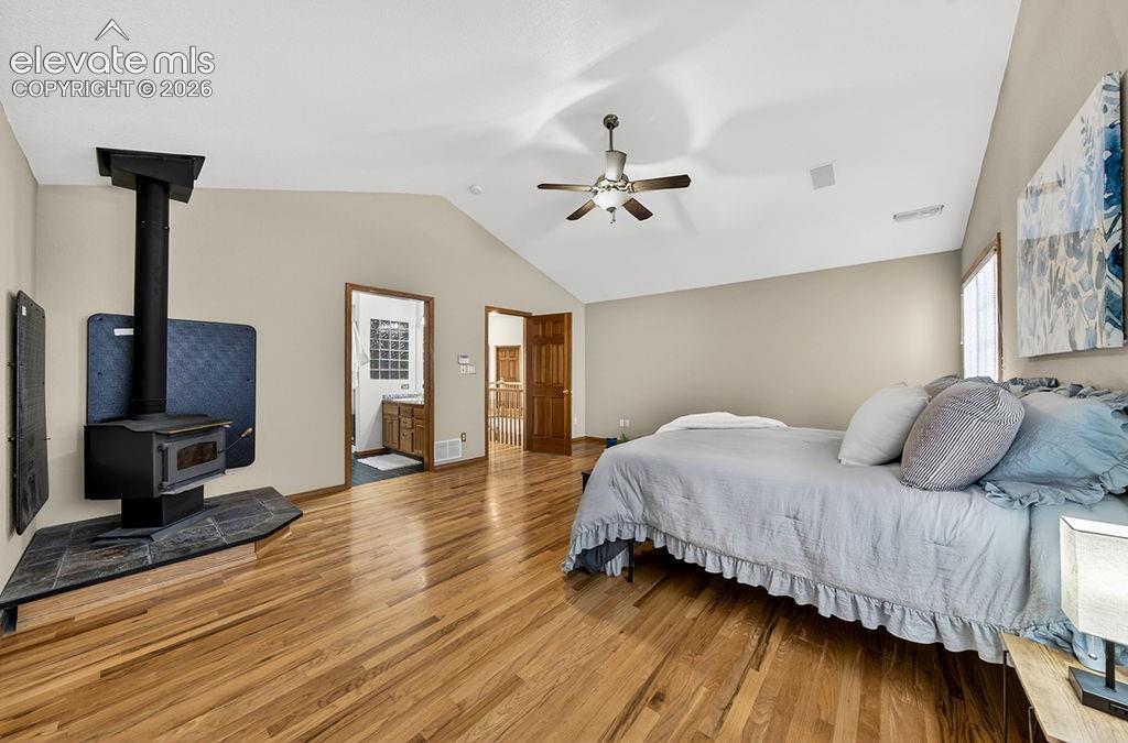 Primary bedroom, wood burning stove