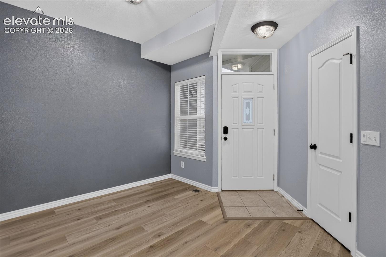 Front entry -- could be an office or sitting room