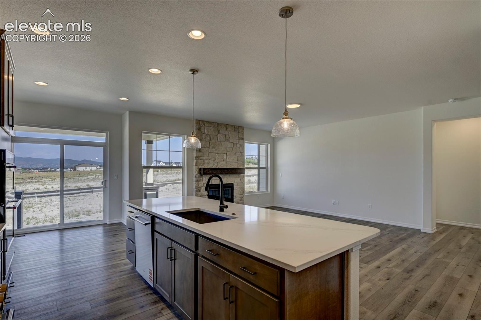 island with sink and quiet-rated dishwasher and disposal