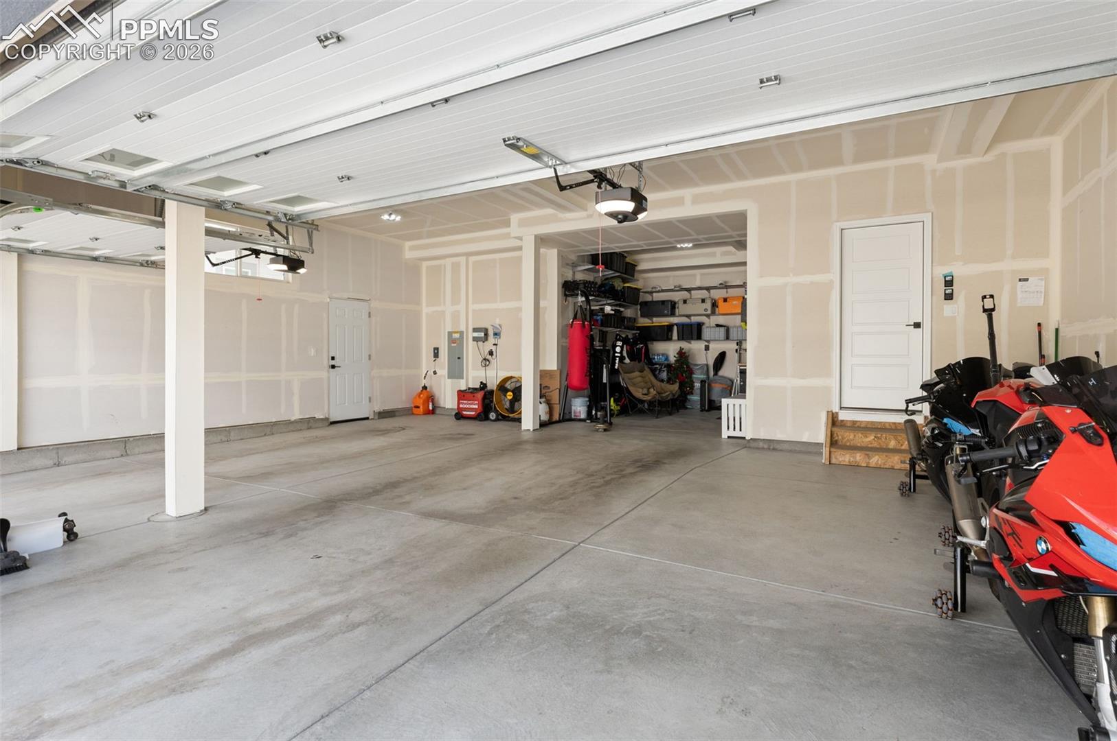 Massive Four Car Garage w/Tandem 4th Bath