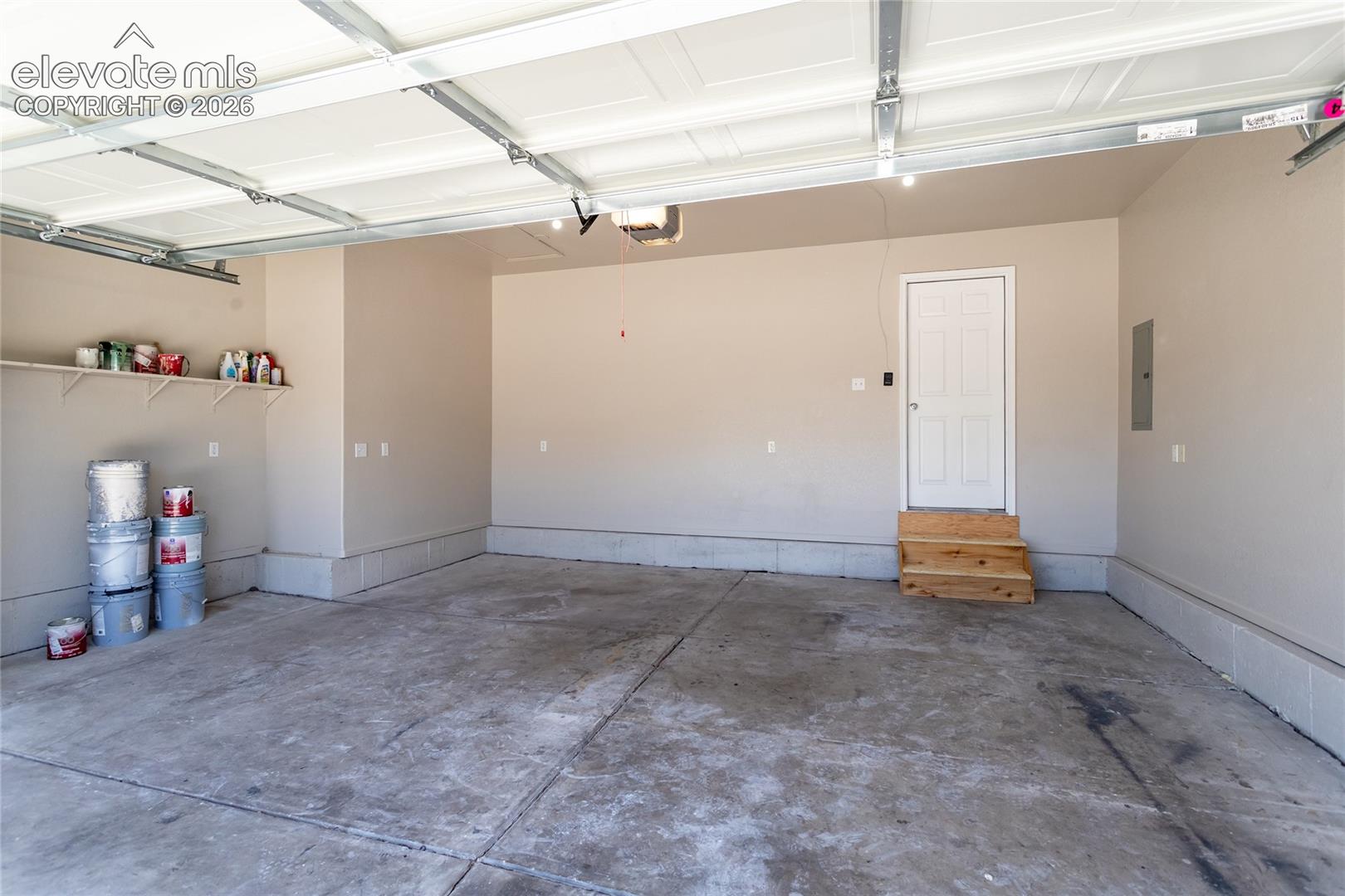 Finished garage, plenty of outlets, room for your vehicles, shop, storage & hobbies!