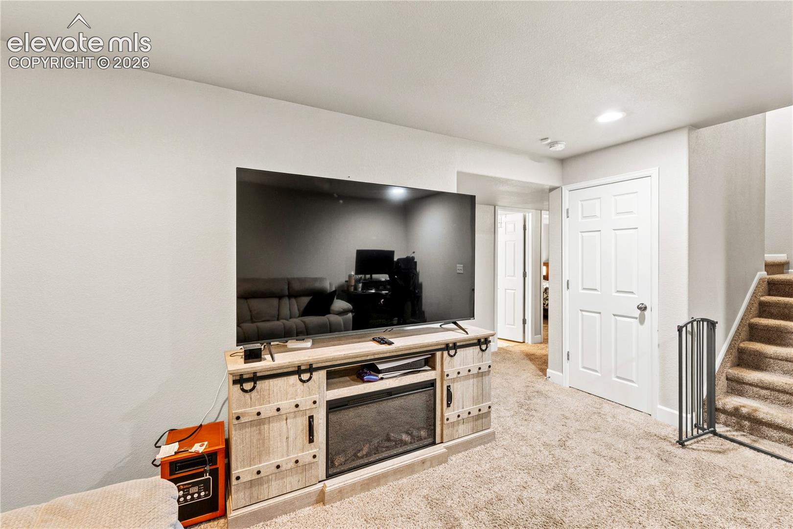 Another view of family room in basement