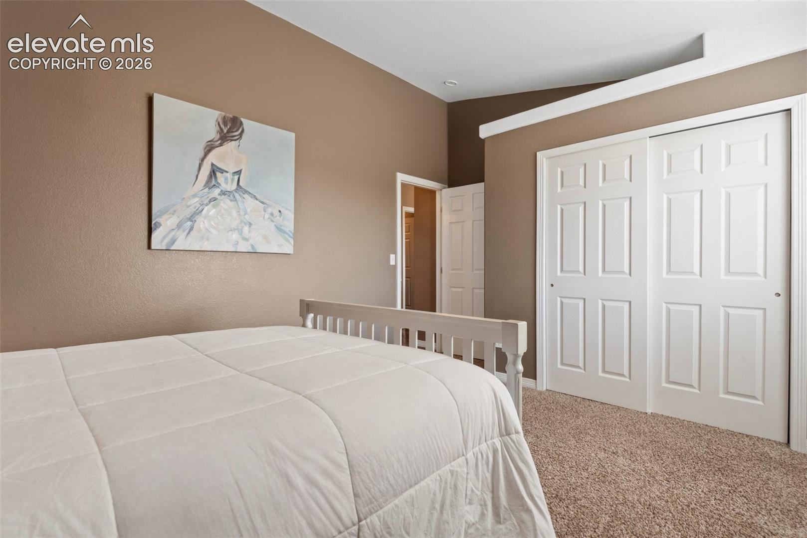 Main Level Third Large Bedroom with Vaulted Ceiling and Beautiful Mountain Views