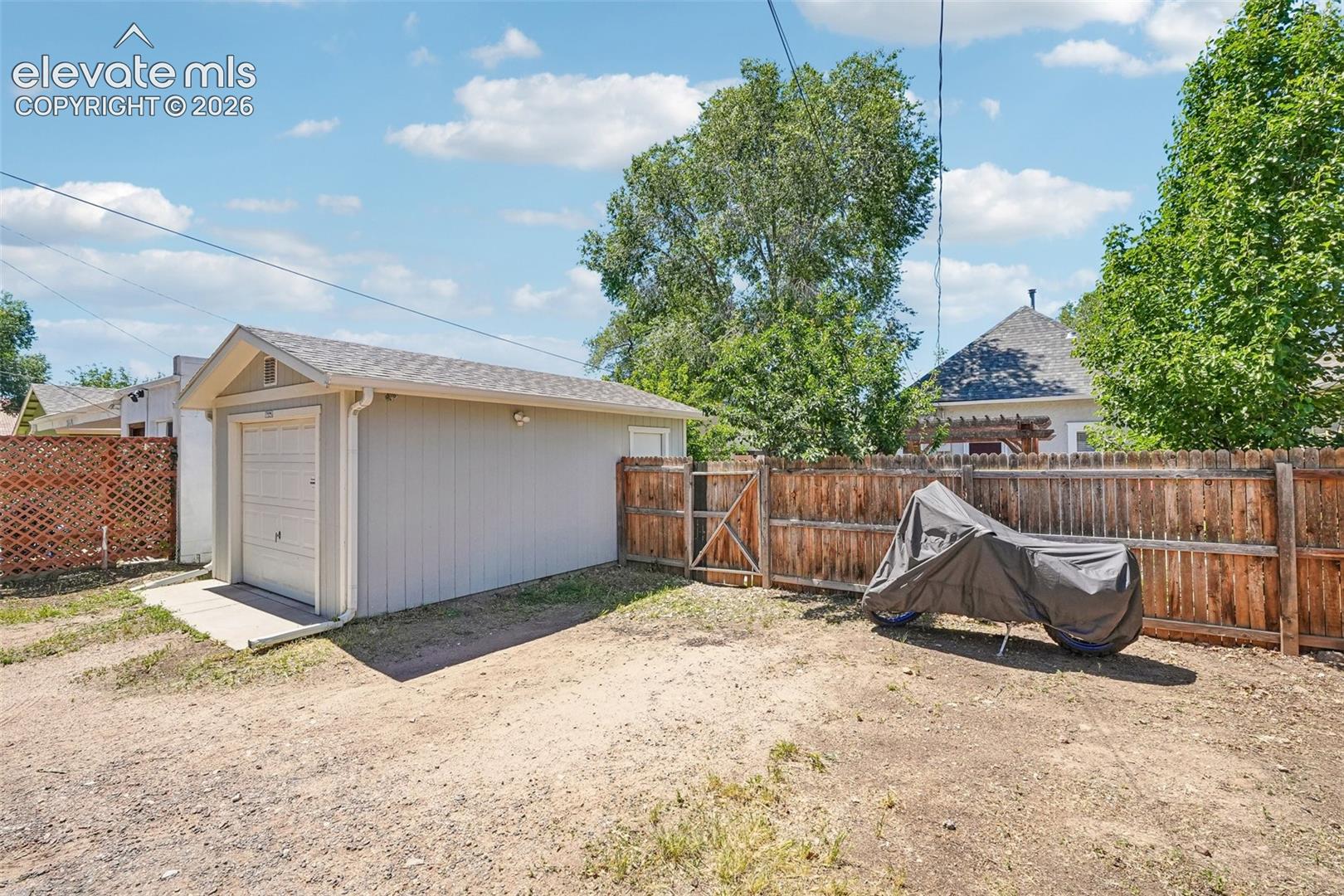 Detached 1 car garage with extra parking spaces or Rv parking