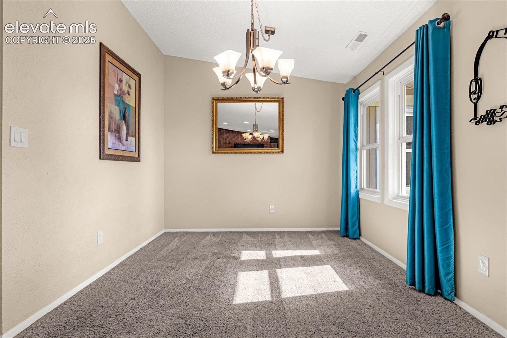 Enjoy meals at your bright, open dining room!