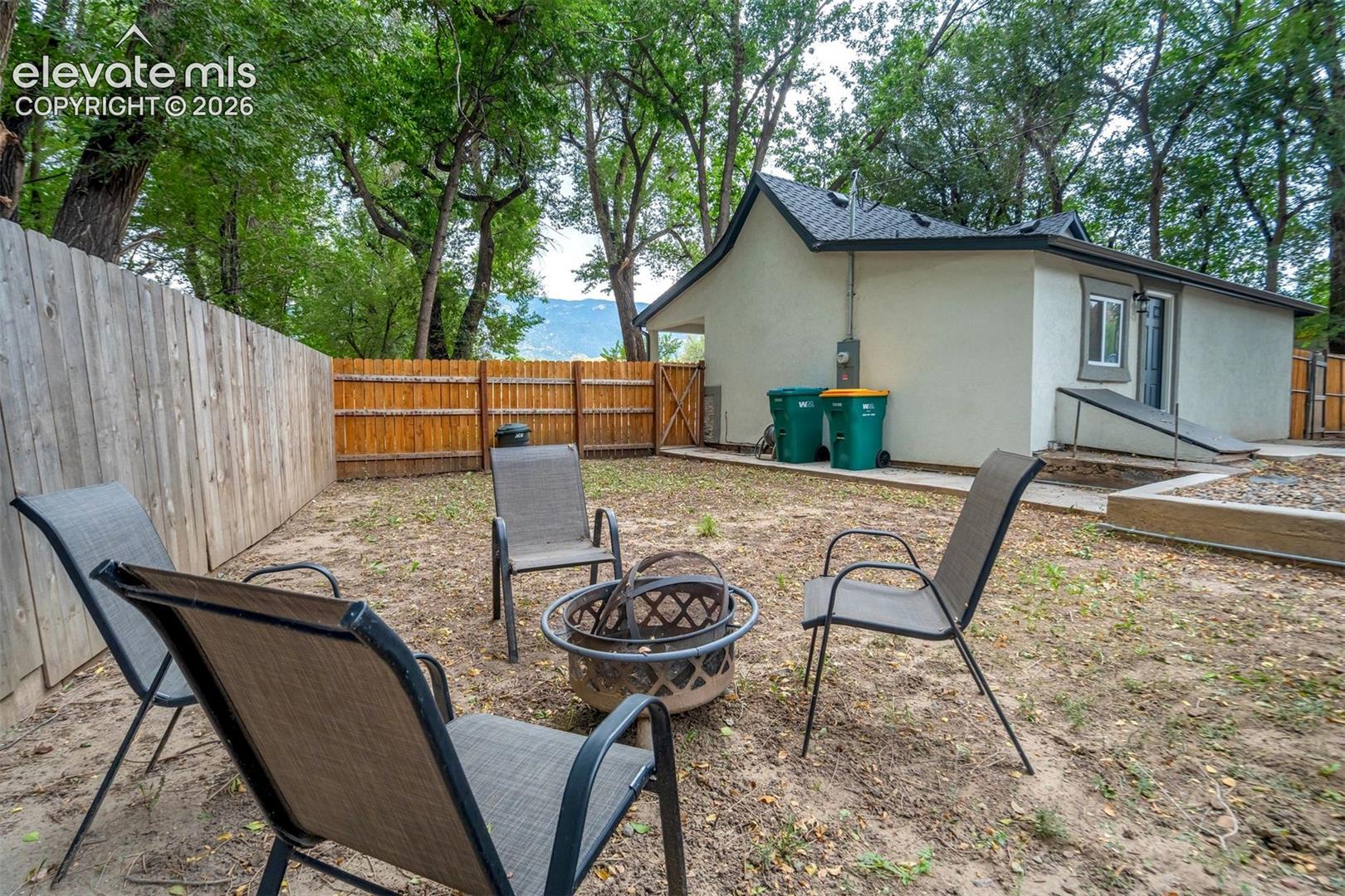 Massive fenced back yard.