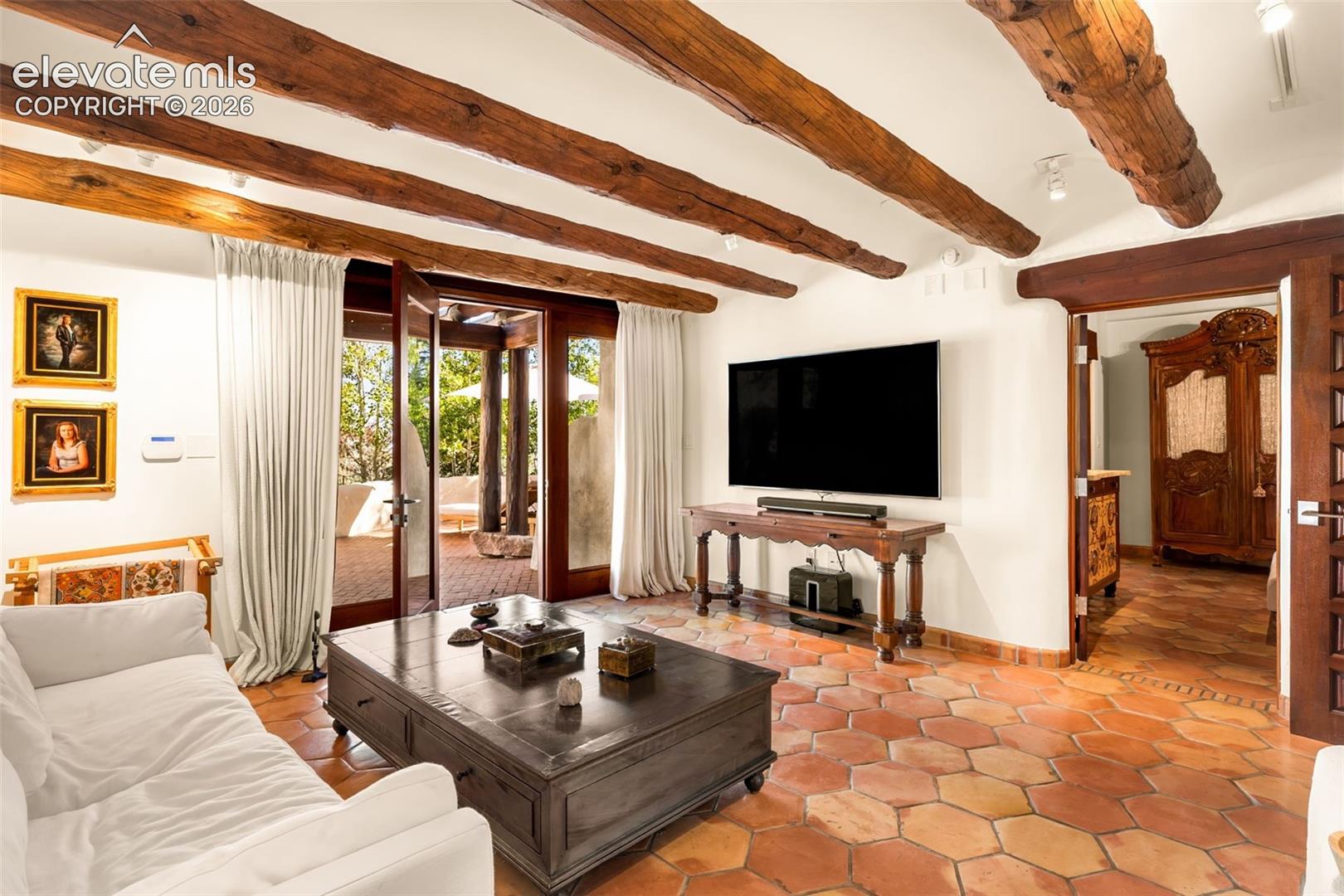 Attached to Dressing Room and Walk-out to Private Patio 