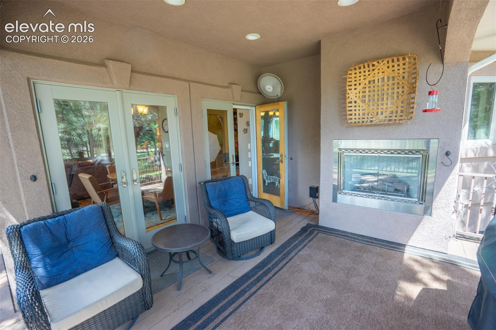 From the dining area step out to the 18x12 covered deck with its own built-in fireplace for cozy nights or warm sunny mornings. The smell of pine trees is fabulous!