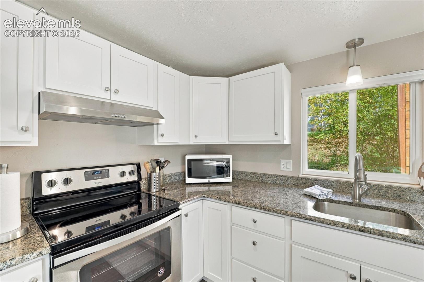 Updated counters and cabinets in the lower level kitchen!