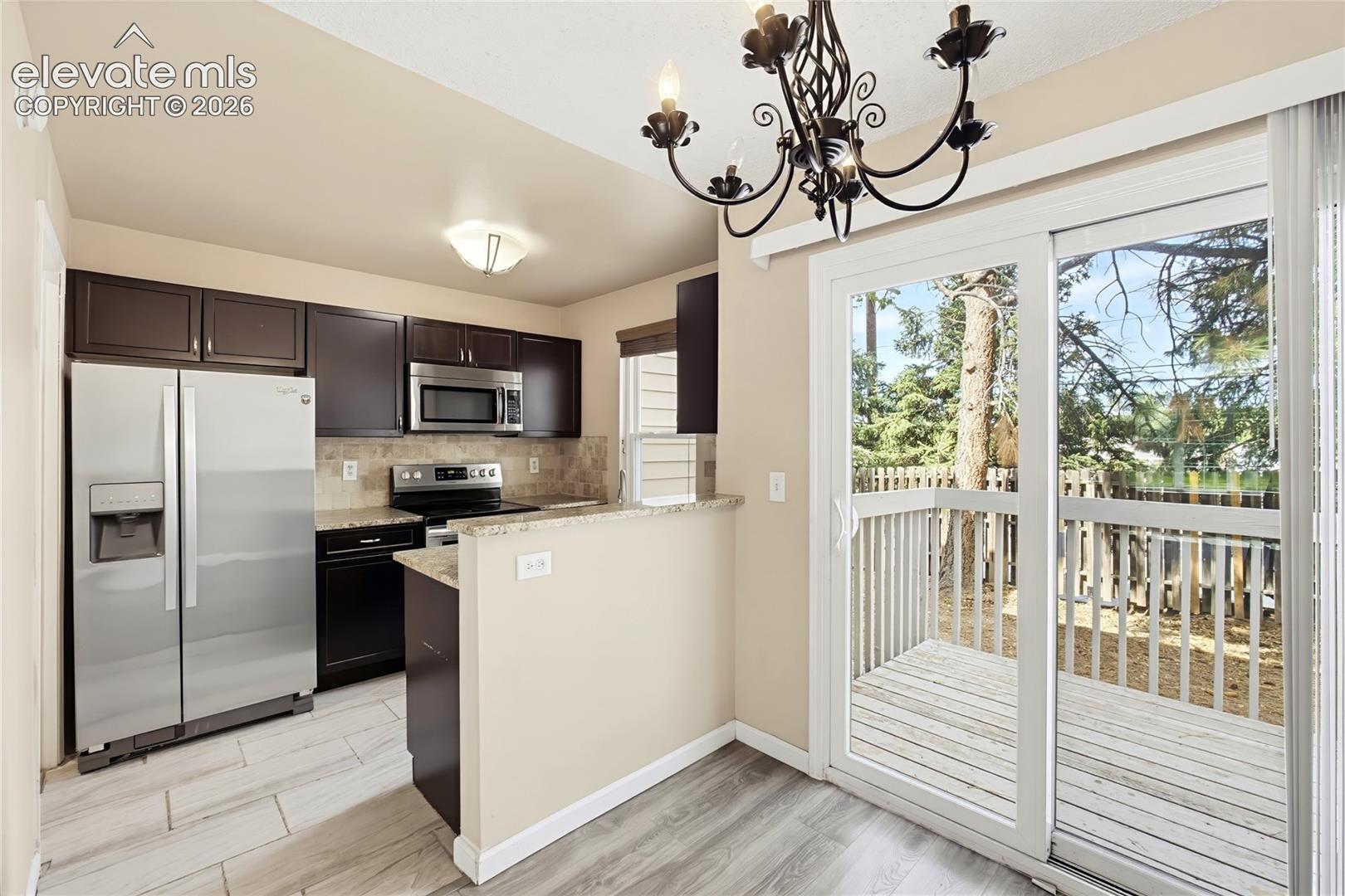 The Dining Area is located off the Kitchen making it easy for entertaining and clean up.