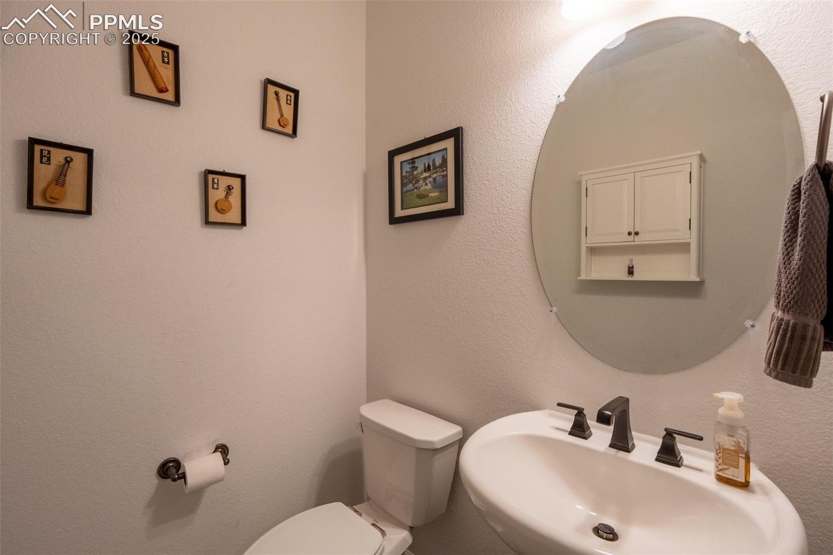 Half bathroom (1) off entrance/foyer - main floor