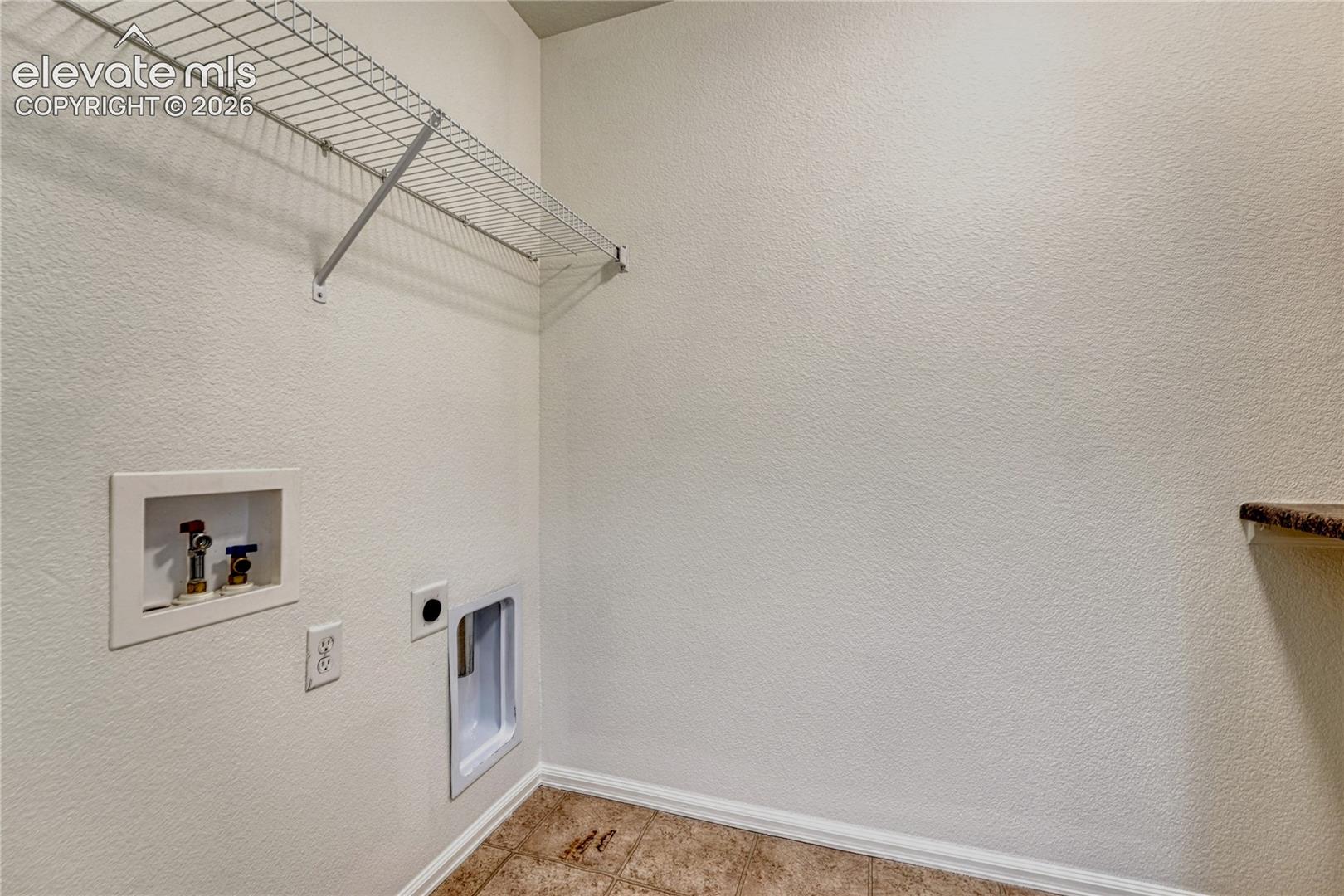 Upstairs laundry room...