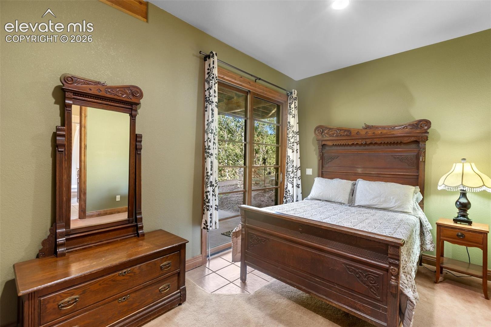 Basement bedroom with access to private patio