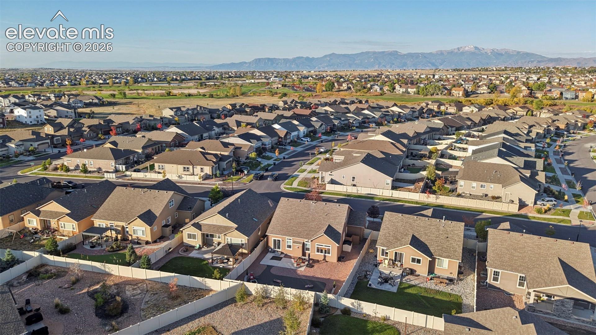 Expansive suburban neighborhood with mountain scenery